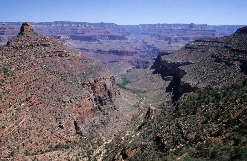 Unbeatable 25-min Grand Canyon South Rim EcoStar Helicopter Tour with Optional Hummer Review Review 2026 - Stunning aerial view of the Grand Canyon, showcasing its rugged terrain and vibrant colors.