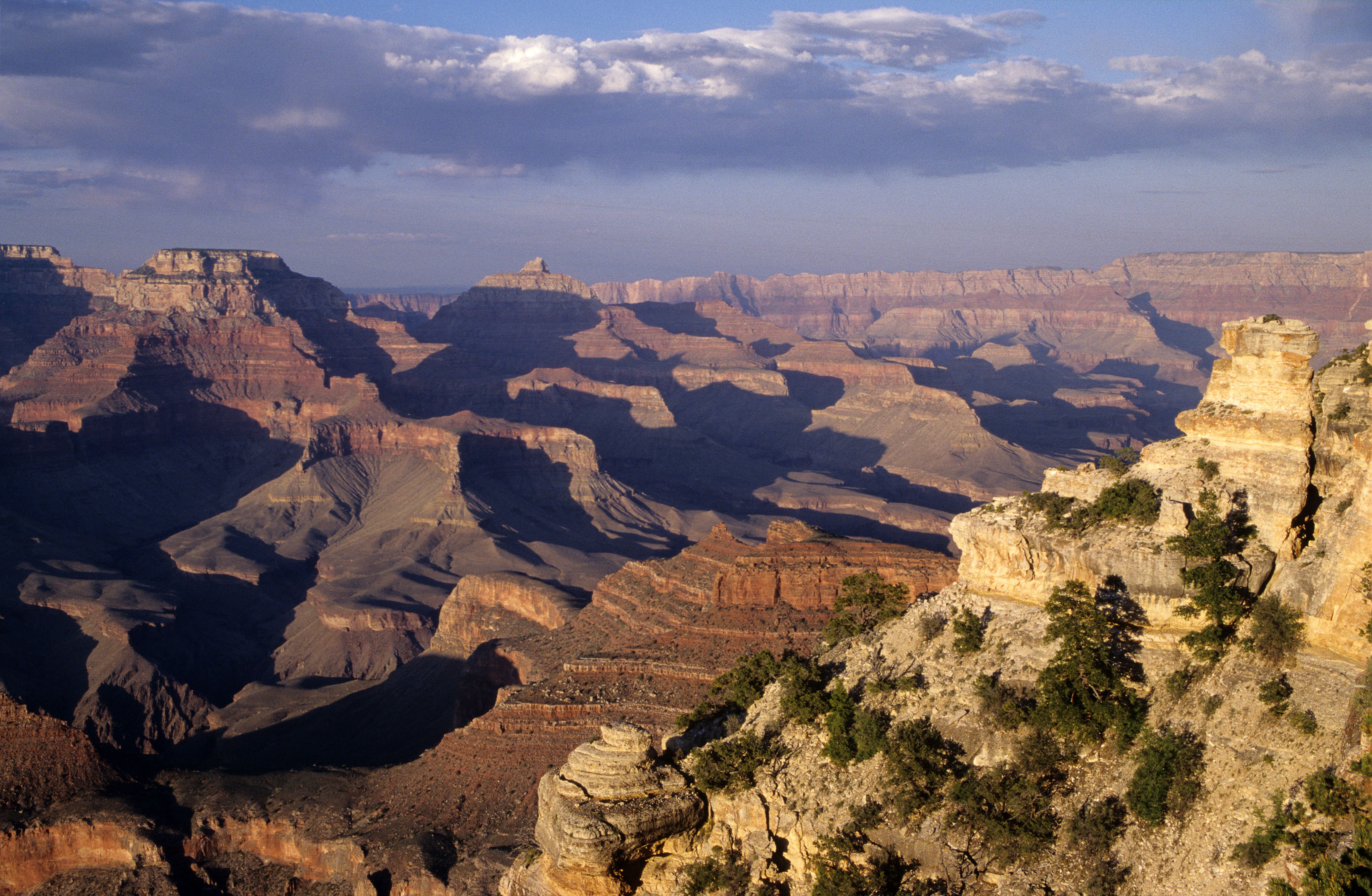 Stunning 45-minute Helicopter Flight Over the Grand Canyon from Tusayan, Arizona Review Review 2026 - Scenic aerial view of Grand Canyon's eroded landscape under a bright sky.