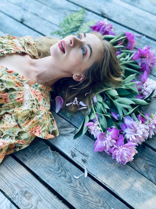 A Woman Lying on the Flowers
