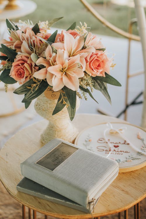 Books and Flowers on Table