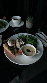 Tempting brunch spread featuring poached eggs and salad at a café in İstanbul.