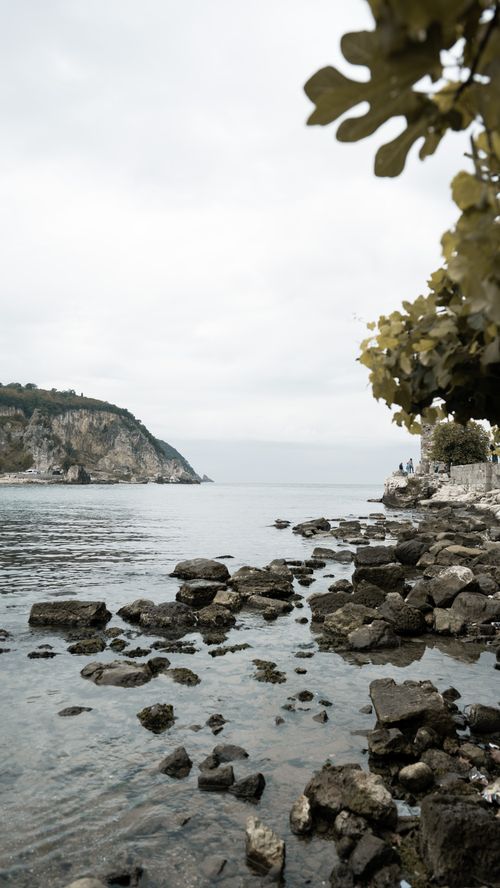 Free Explore the scenic rocky shoreline of Amasra, Turkey under a moody sky. Stock Photo