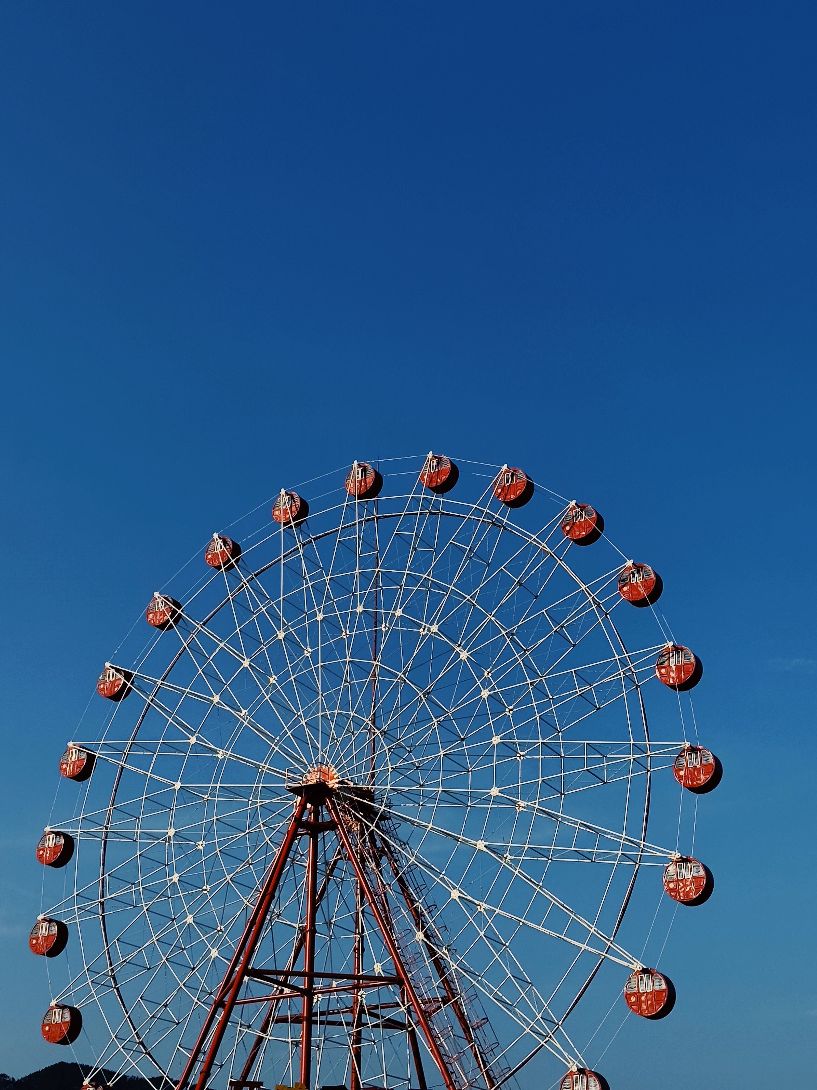 A Ferris Wheel Under the Blue Sky · Free Stock Photo