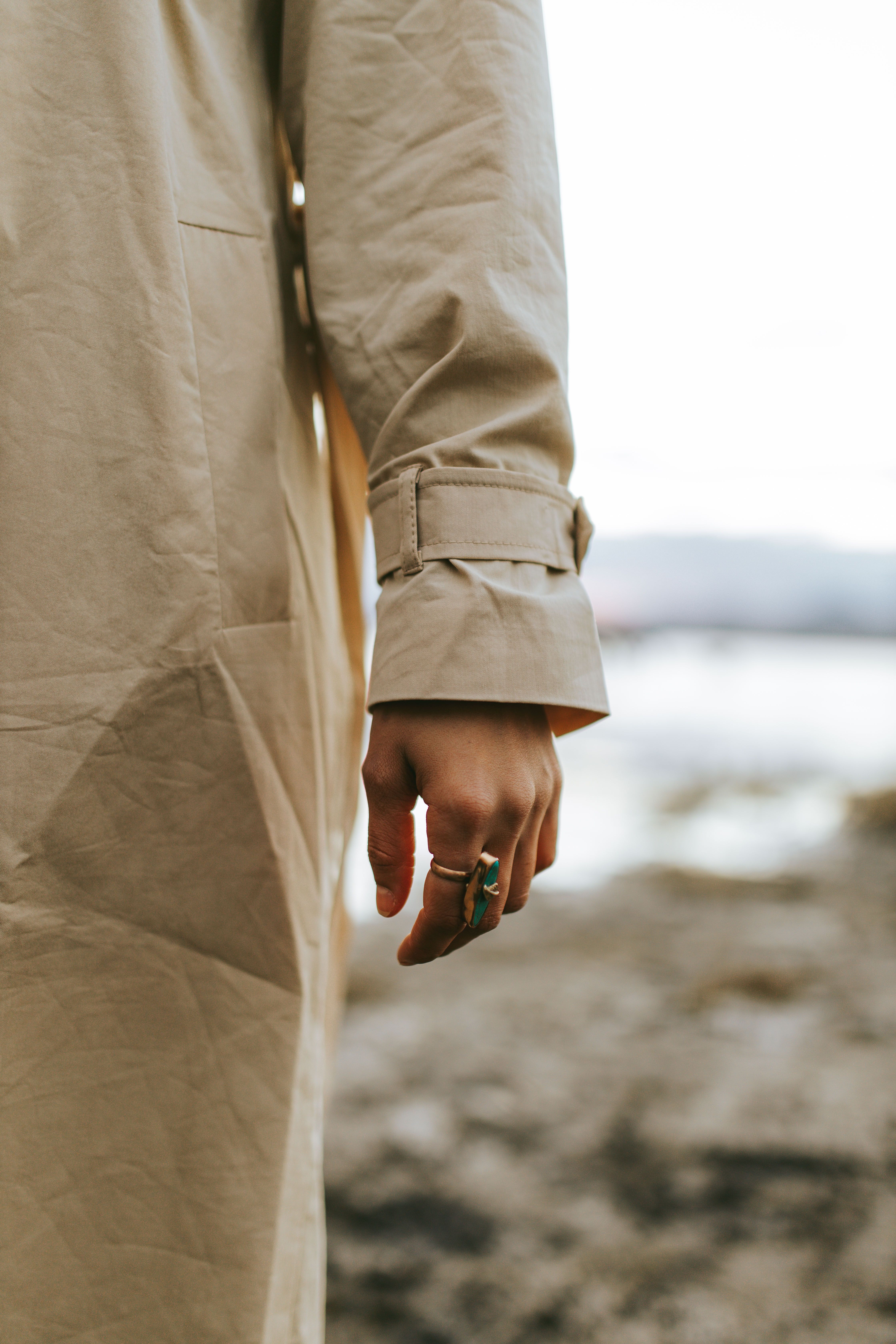 Woman in Brown Trench Coat Wearing a Ring · Free Stock Photo