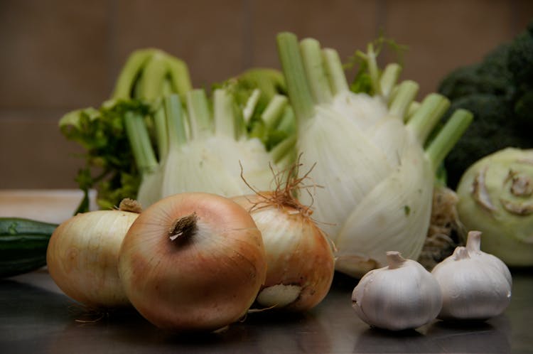 Onions Next To Bulbs Of Garlic 