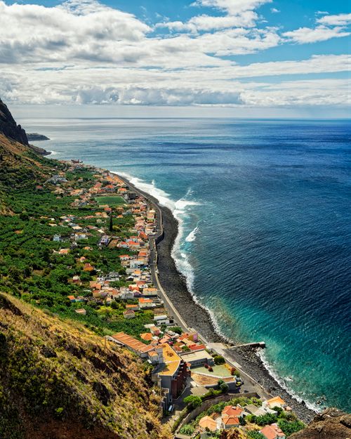 Free Breathtaking aerial view of Paul do Mar along Madeira's coastline. Stock Photo