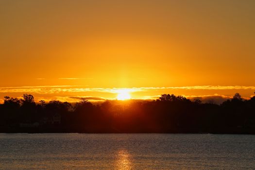 Beautiful sunrise over Cove Island Park in Stamford, CT, capturing serene nature and warm colors.
