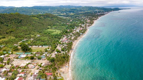 Aerial View of a Town Near Body of Water