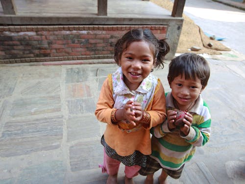 Smiling Children Standing Side by Side