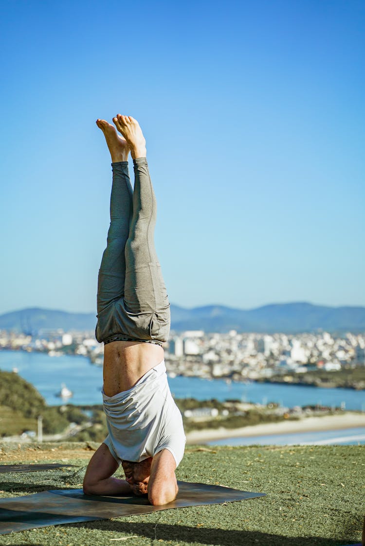 Man During Yoga Headstand