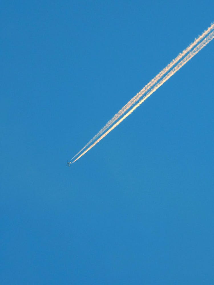 Trace Of Airplane On Clear Sky