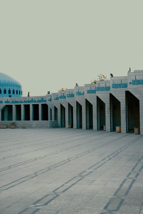 Free Stunning architectural view of King Abdullah Mosque, Amman, with its unique facade and columns. Stock Photo