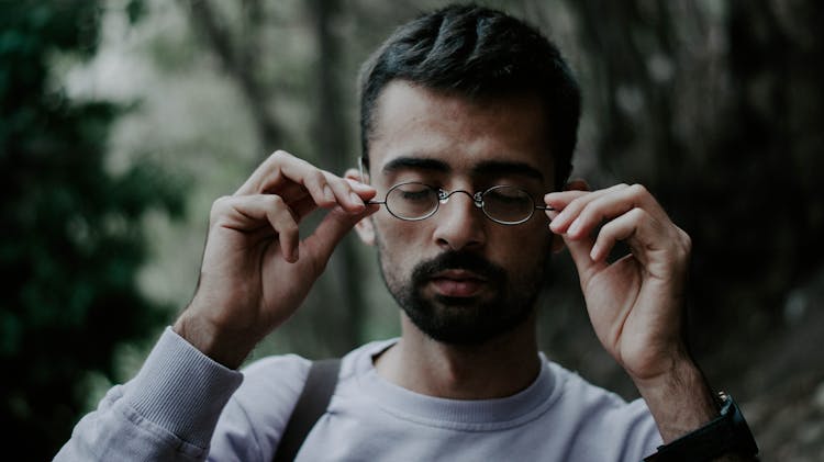 Man Wearing Black Framed Eyeglasses