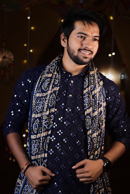 Bearded Man Wearing Blue Printed Shirt with a Scarf