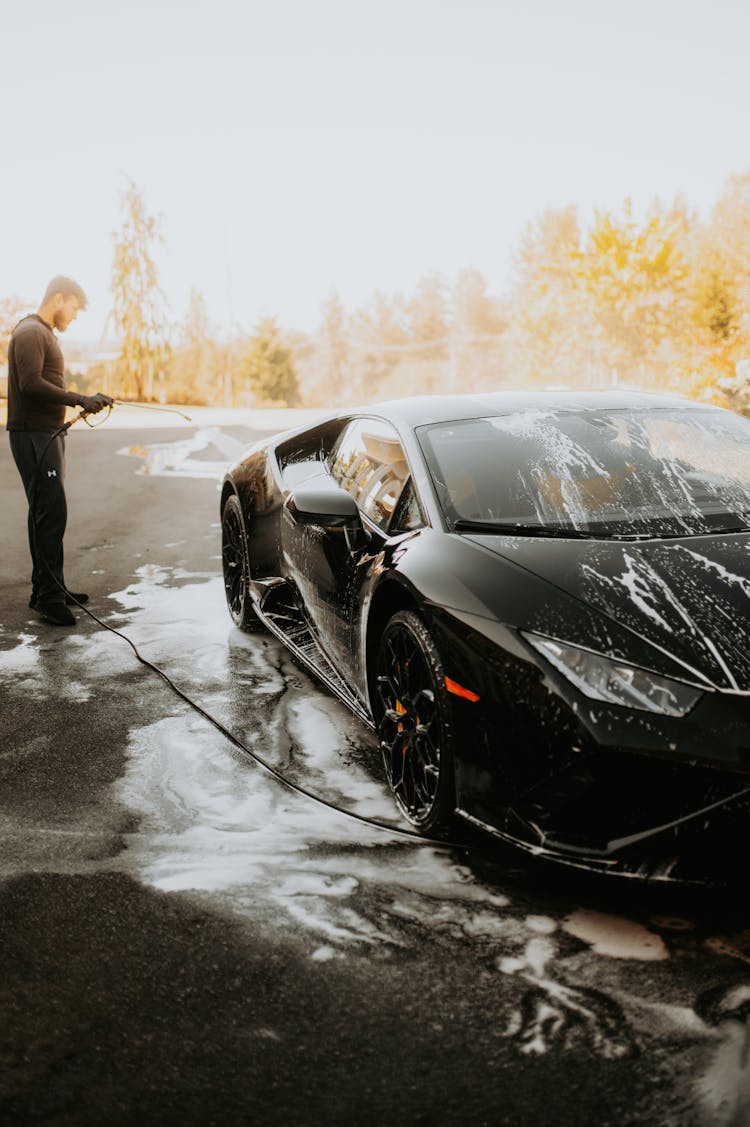 Man Washing His Car