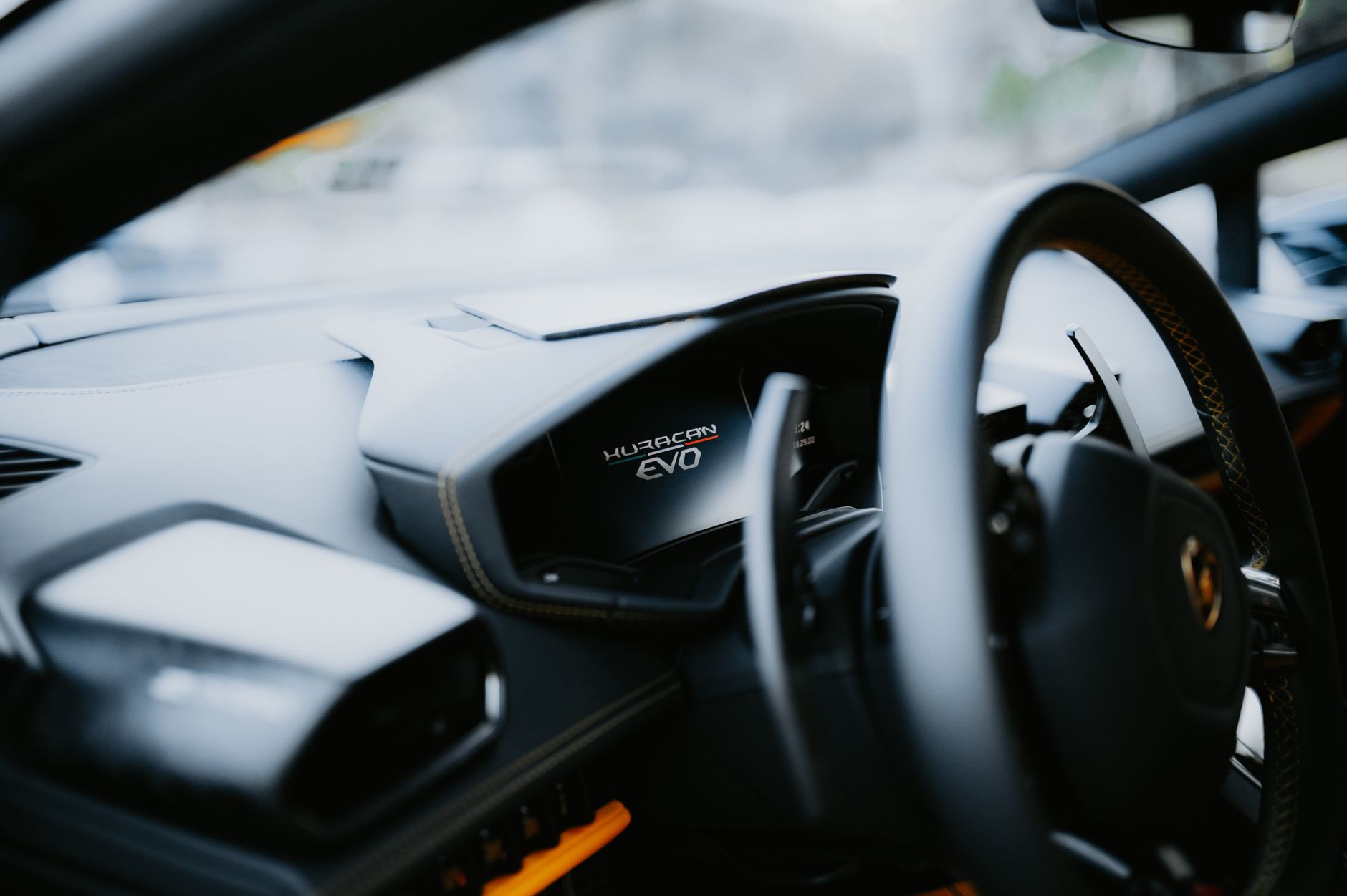 Explore the sleek and luxurious interior of a Lamborghini Huracan EVO, showcasing its modern dashboard design.