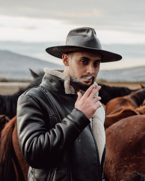 Man in Hat and Jacket and with Cigarette