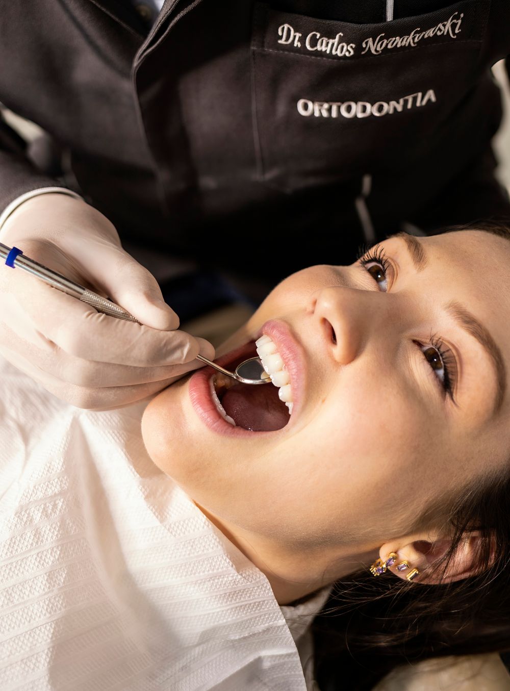 Woman receiving veneers consultation and dental checkup in Jacksonville clinic