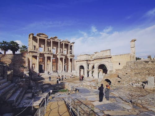 People Standing Outside the Library of Celsus in Turkey