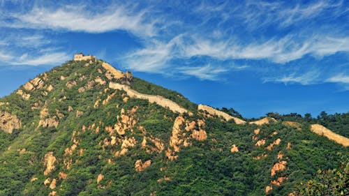 Green Hills Under Alto Cirrus Clouds