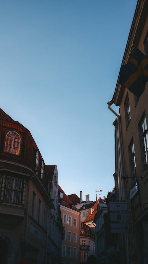 Facades of Buildings in City under Blue Sky 