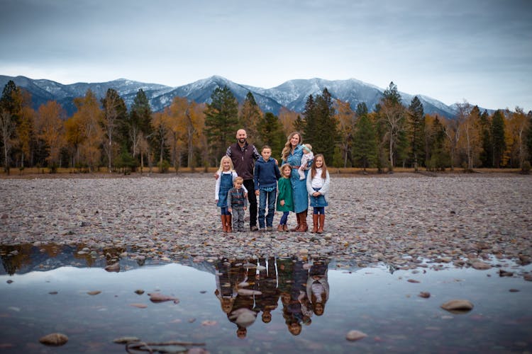 Large Family Portrait In Mountains