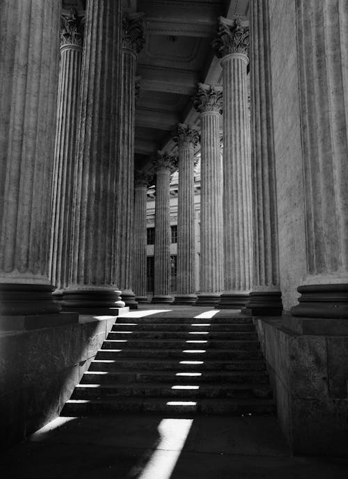 Free Grayscale Photo of Hallway With Columns Stock Photo