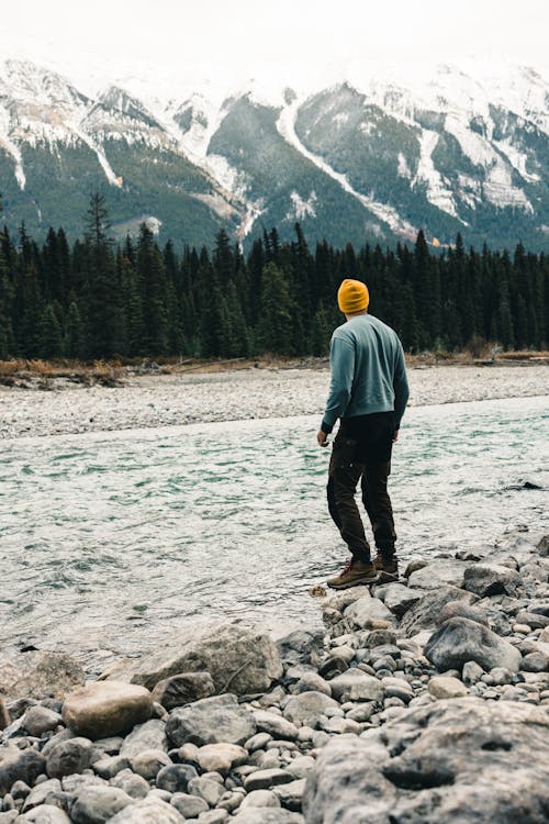 Man Near a River in Kootenay National Park in Canada