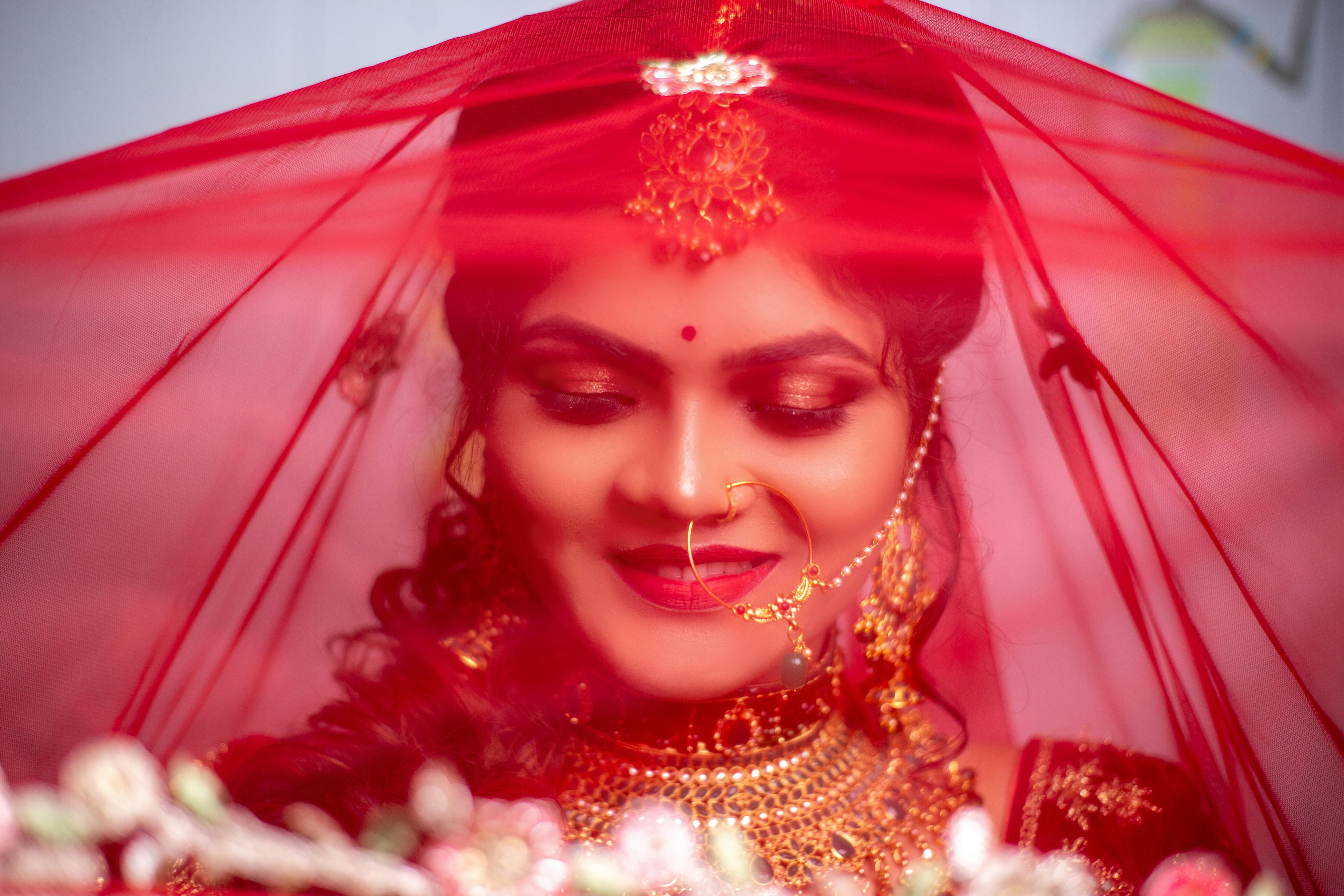 A Beautiful Bride Wearing Gold Necklaces · Free Stock Photo