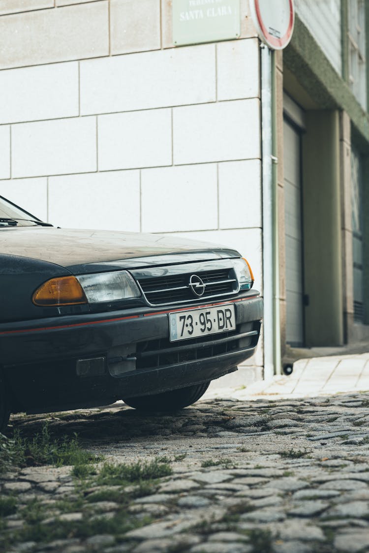 Retro Car Hood On Paved Street