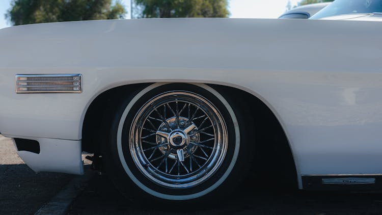 Close-Up Photo Of White Classic Car