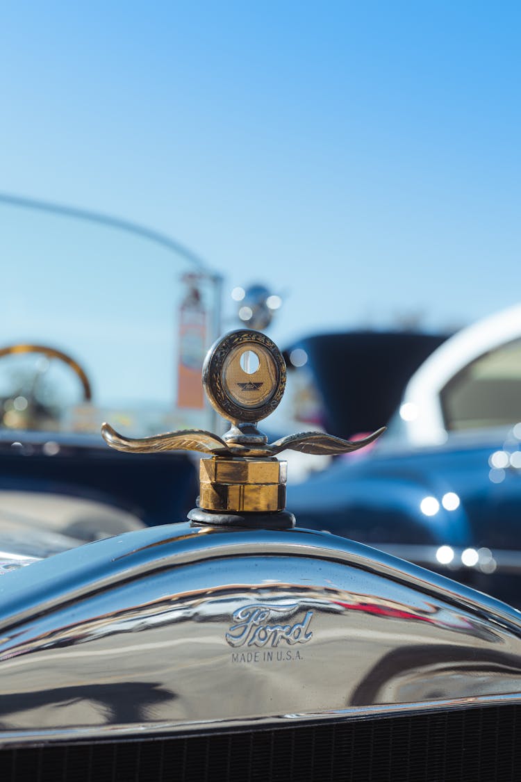 Vintage Car With Chrome Emblems