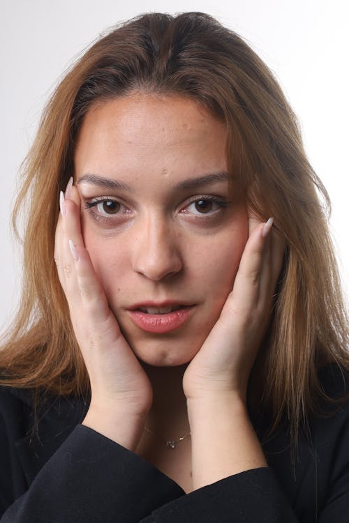 A Woman in Black Shirt Smiling