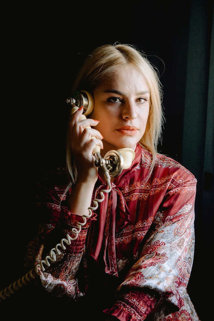 Woman Posing With Telephone