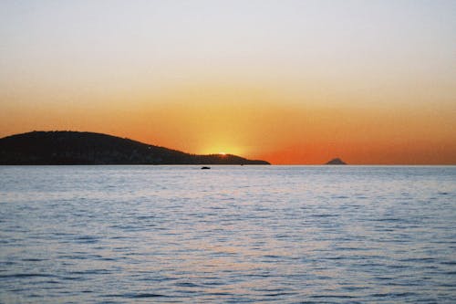 açık hava, akşam karanlığı, deniz içeren Ücretsiz stok fotoğraf