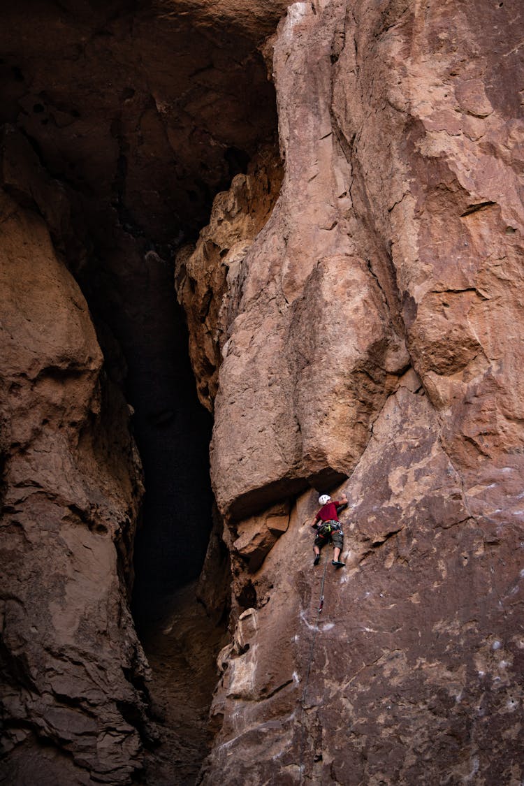 Person Rock Climbing