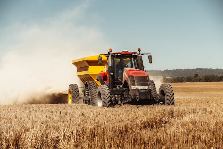 Tractor Driving Through Field