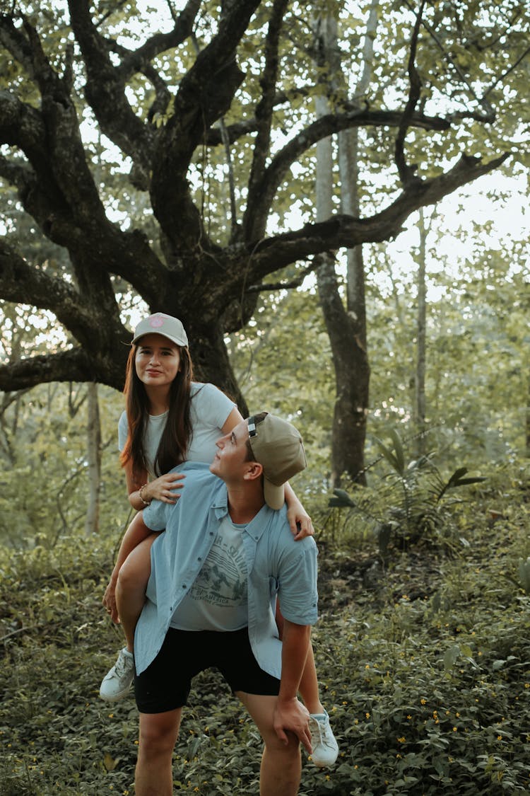 Man Carrying Her Girlfriend 