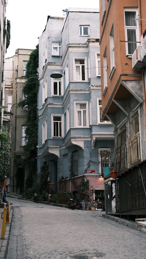 Narrow Street between Concrete Buildings