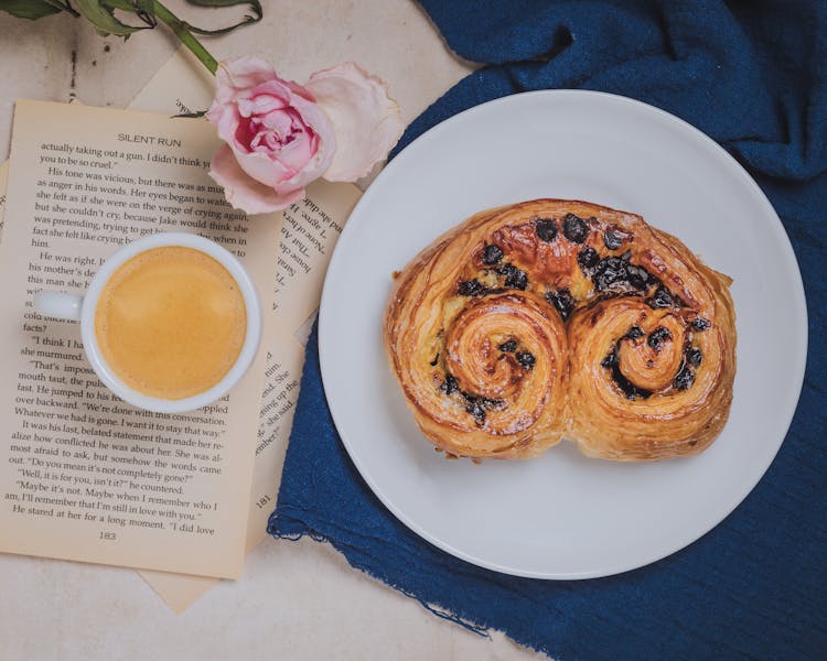 Top View Of Coffee And A Danish