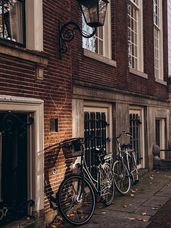 Bicycles Parked outside a Building · Free Stock Photo
