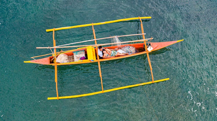 Drone Shot Of A Couple On A Boat