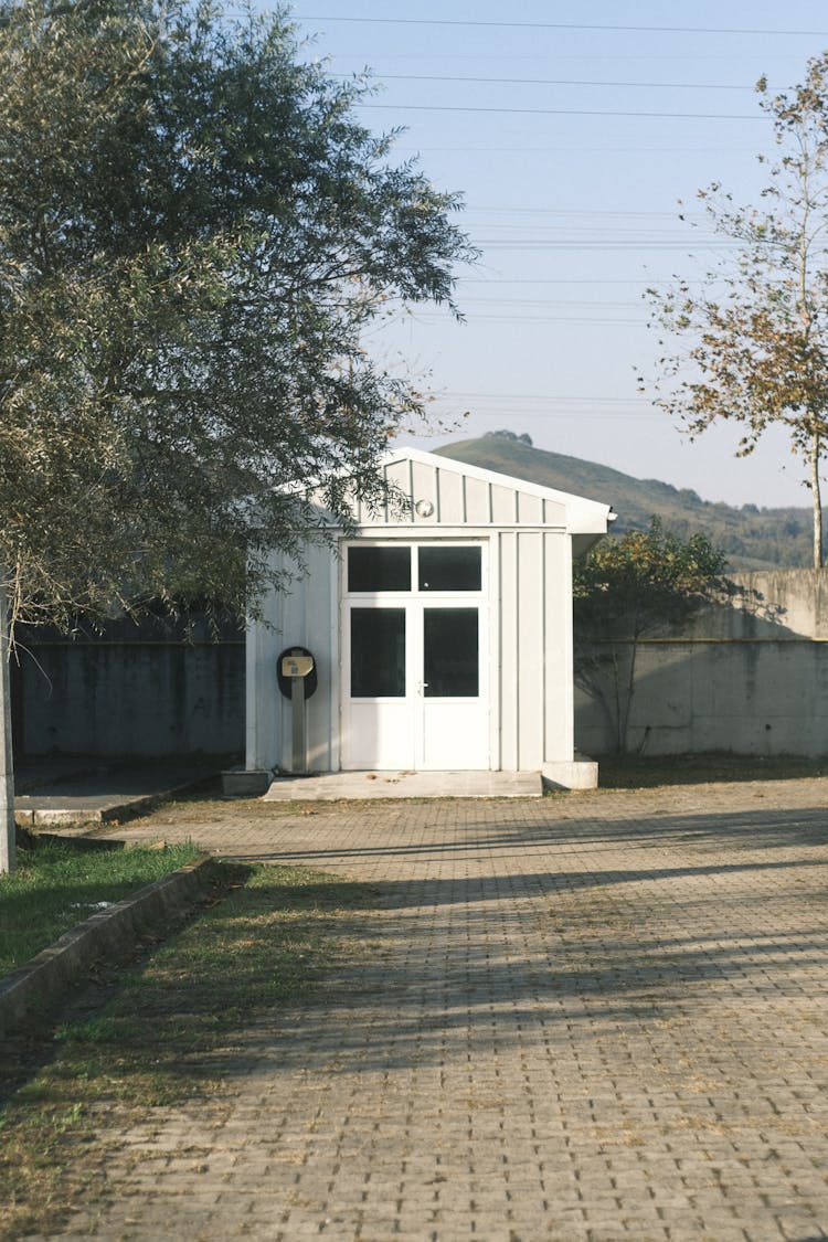 Little Wooden Building In Yard