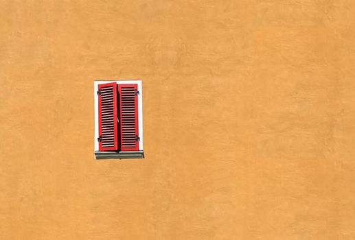 Window in an ochre wall