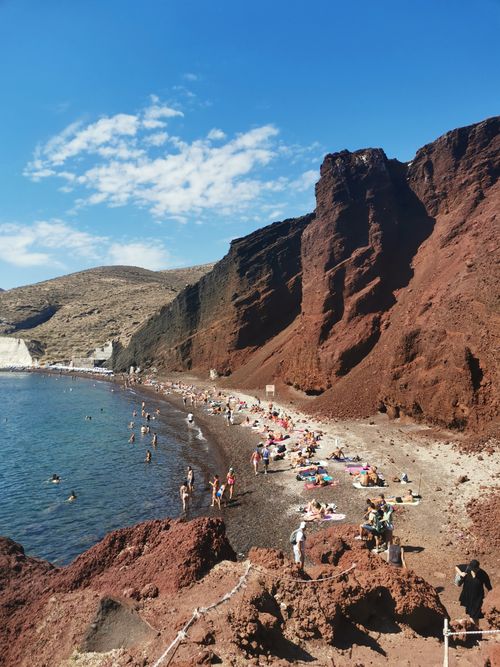 Free Explore the stunning Red Beach in Santorini, Greece, known for its unique red cliffs and vibrant summer atmosphere. Stock Photo