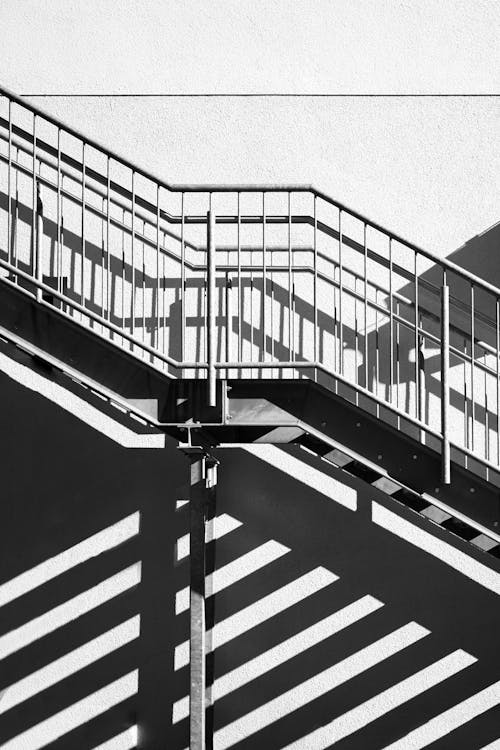 Metal Stairs on the Concrete Wall