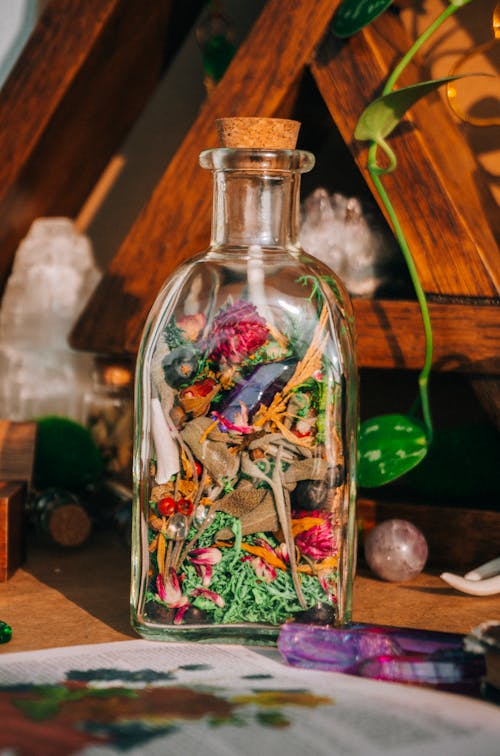 Clear Glass Bottle with Dried Flowers