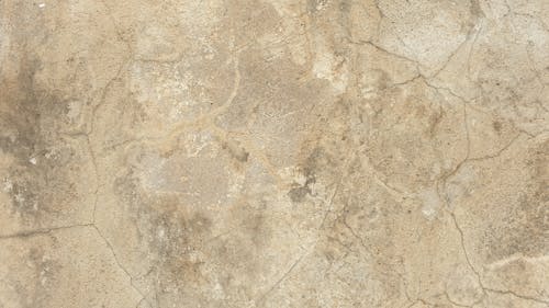 A Gray Concrete Surface with Cracks