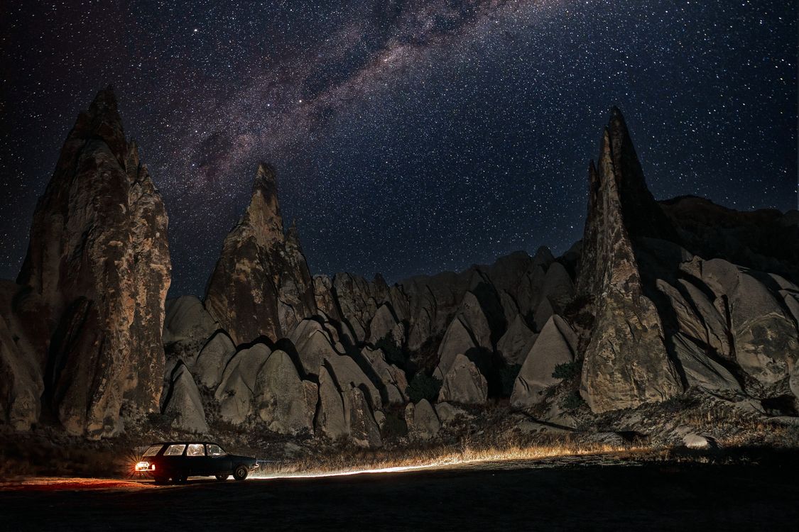 Sky Behind Rocks Starry Sky above Rock Formations in Desert · Free Stock Photo