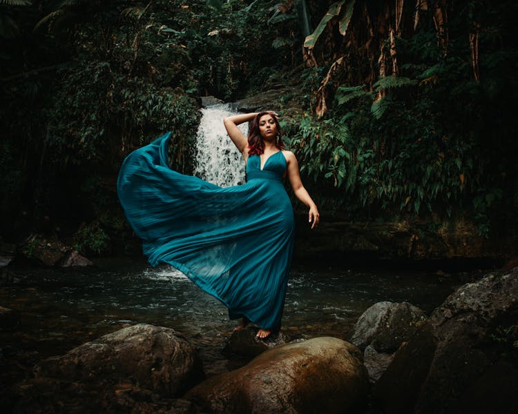 Woman In Dress On Rocks